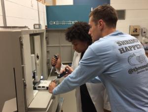 two students running a Cellular test 